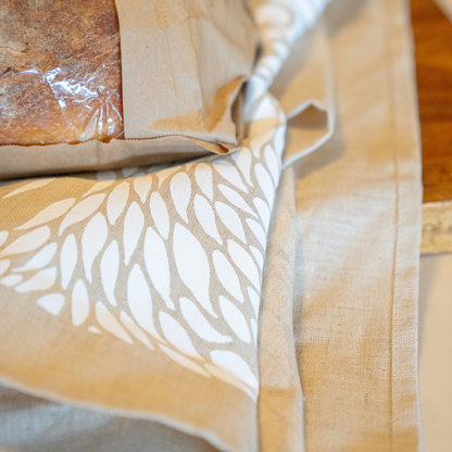 Bait Ball Linen Tea Towel – White Print on Oatmeal by Jess Scott