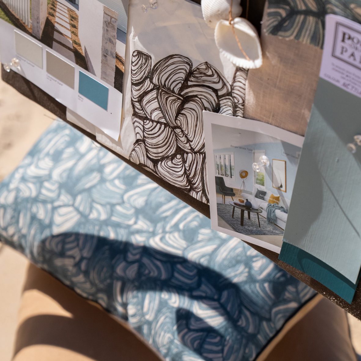 Close-up of the Frenchmans Pipi design inspiration board with artwork, interior references and colour samples.