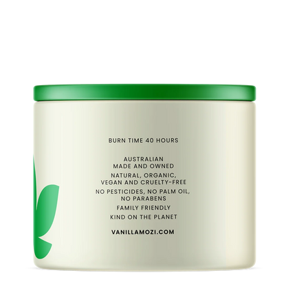 Vanilla Mozi candle with green lid on a white background