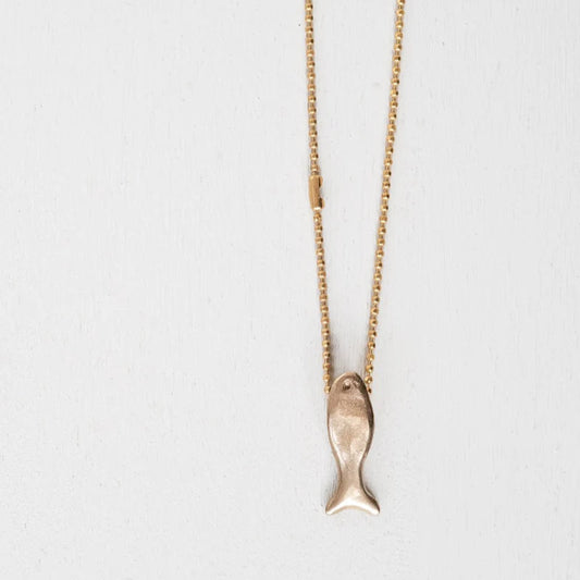 Bronze chain necklace with a fish pendant on a light gray background