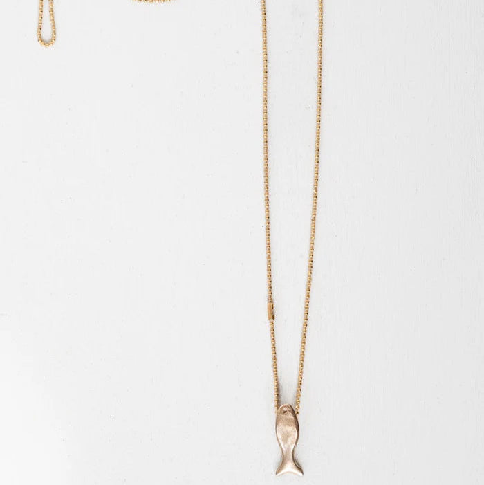 Bronze necklace with a fish pendant on a white background