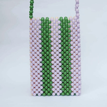 Beaded pouch with green, white, and pink stripes on a light gray background