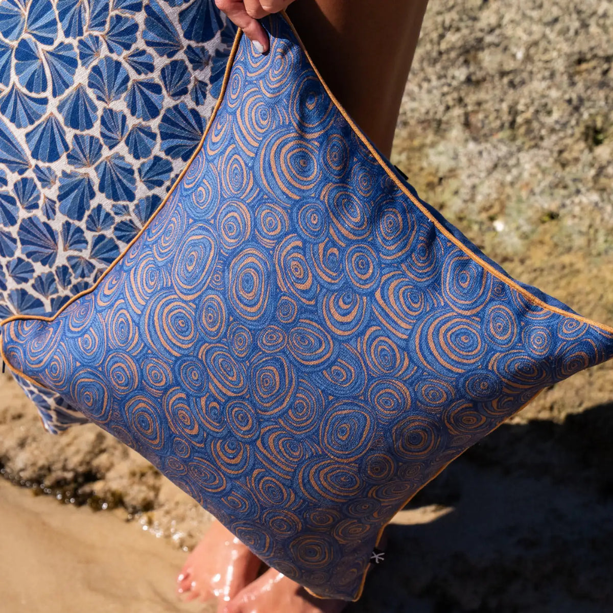 Growth Rings Mariner linen cushion cover in navy blue and ochre with coordinating Shells cushion