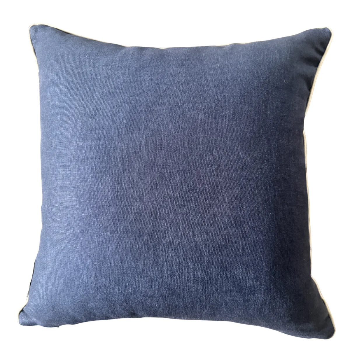 Navy linen reverse of square Pacific Pipi cushion cover with natural piping