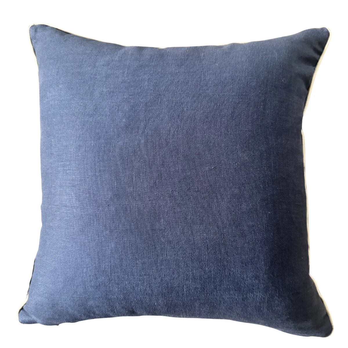 Navy linen reverse of square Pacific Straddie Stripe cushion cover with natural piping