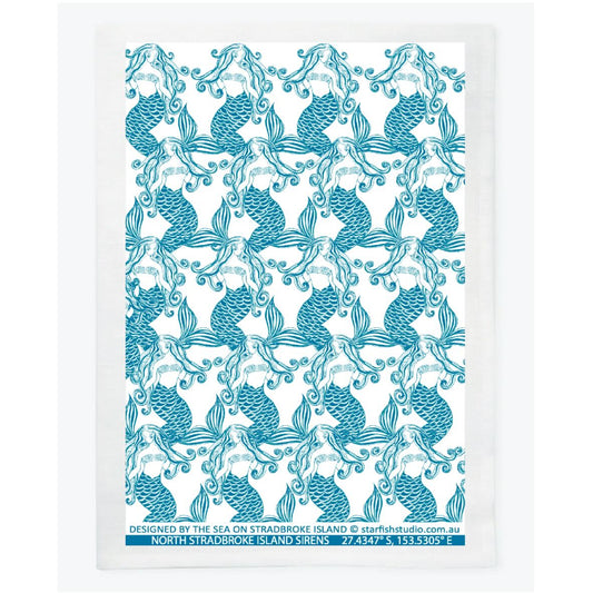 Mermaids Blue pure linen tea towel shown flat, featuring the full repeating mermaid print